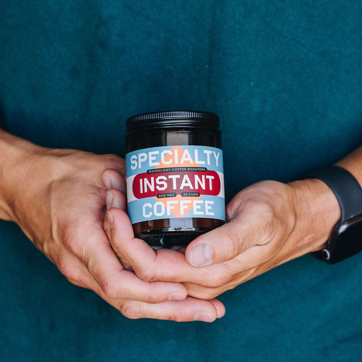 Specialty Instant Coffee Micrology Coffee Jar in Hands