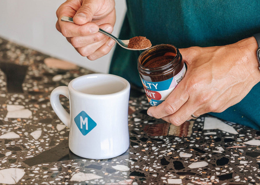 Specialty Instant Coffee Micrology Coffee Scooping Into Mug